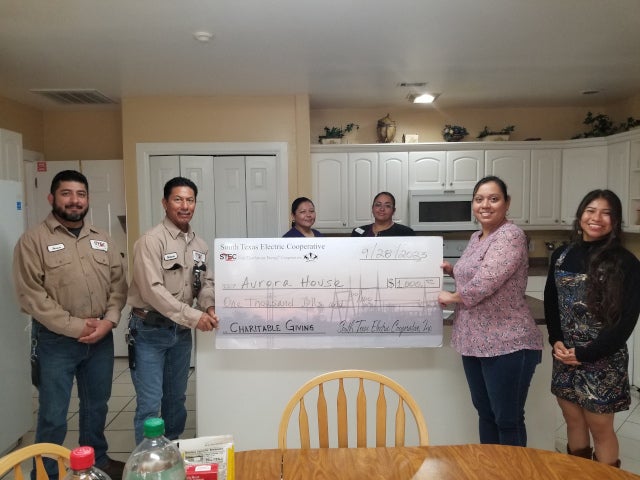 Aurora House check presentation