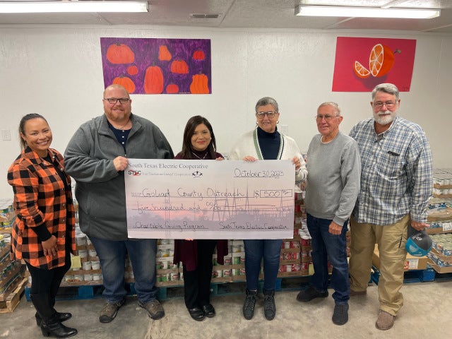 Goliad County Outreach check presentation