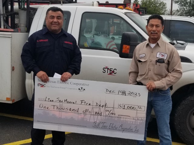 Linn San Manuel Volunteer Fire Department check presentation