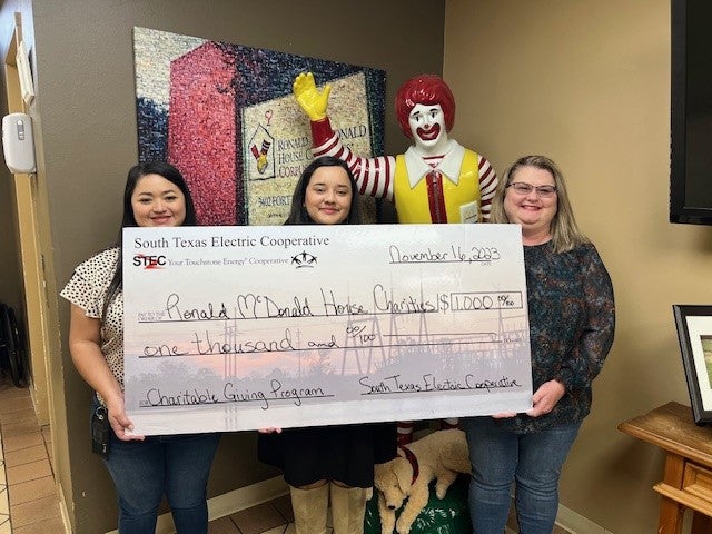 Ronald McDonald House check presentation