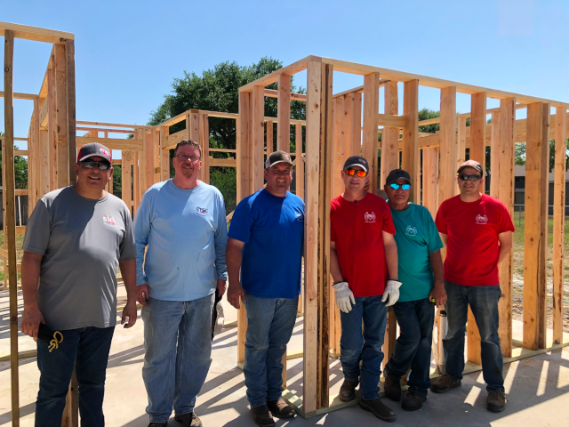 STEC employees at Habitat for Humanity build